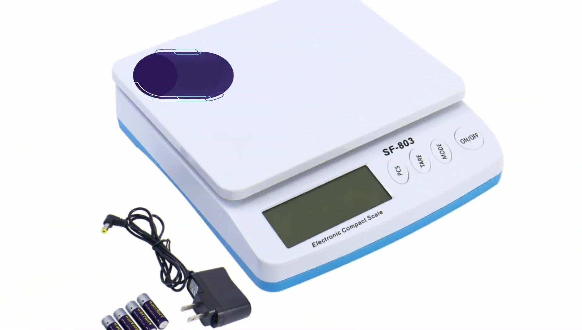The scale highlighting the display and buttons.
