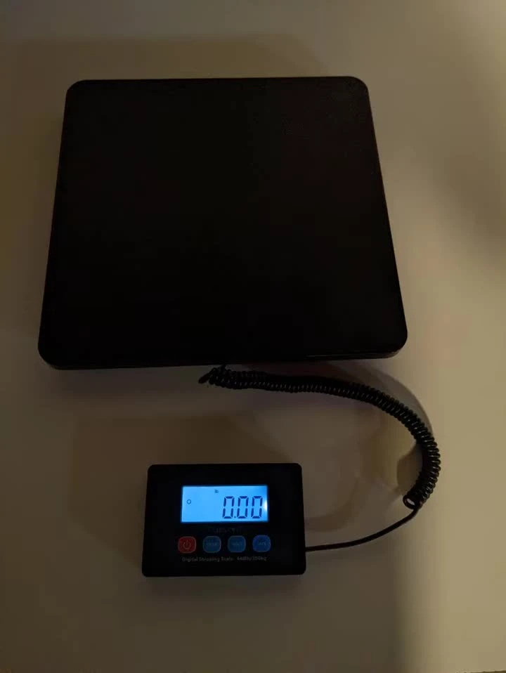 The compact shipping box of the Fuzion Digital Shipping Scale.