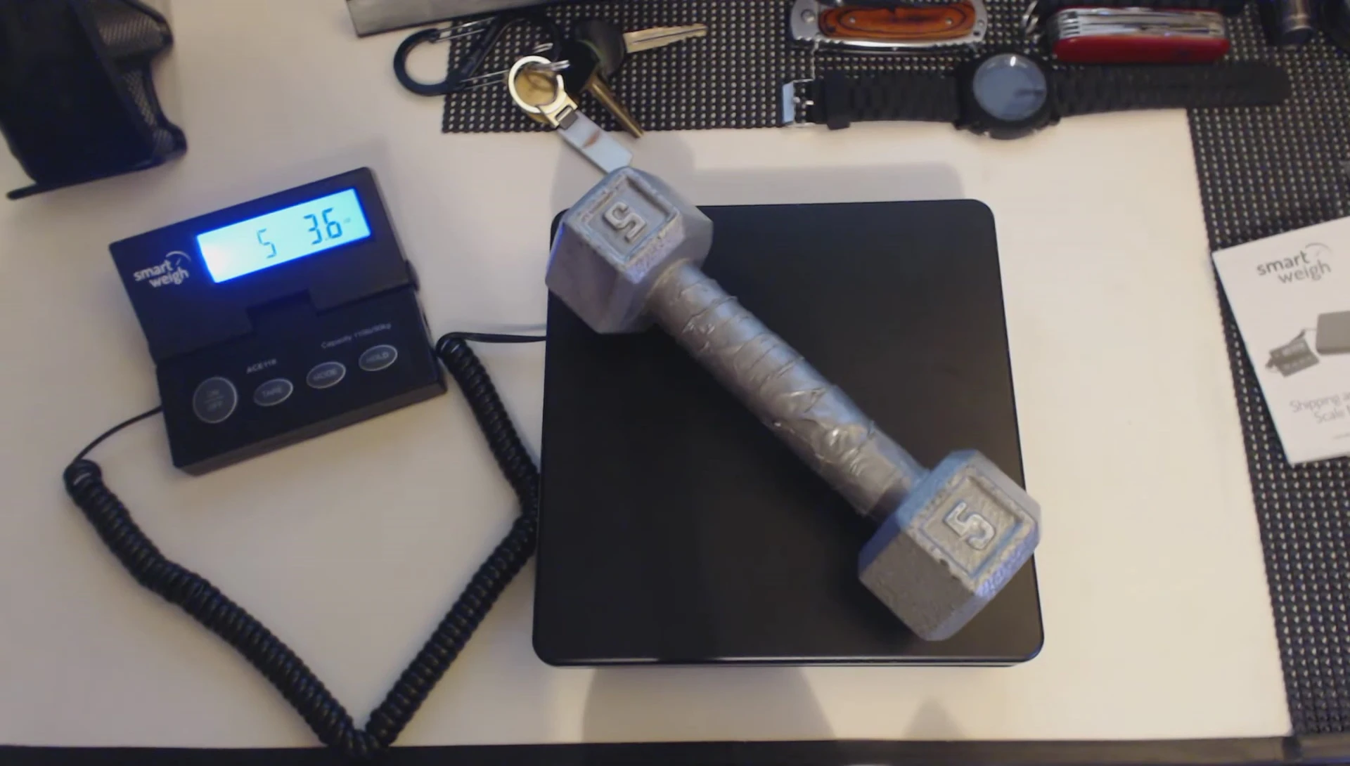 Testing the scale with a 5-pound weight