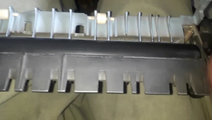 Open and clean the comb mechanism to remove any obstructions or stuck ink.