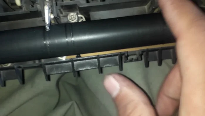 Open and clean the comb mechanism to remove any obstructions or stuck ink.