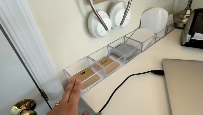 Organize small items like necklace cards, earring cards, polishing cloths, etc., using acrylic organizers.