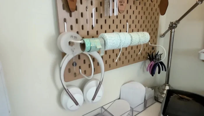 Use pegboards to hang tools and frequently used items like headphones, pliers, washi tape, and twine.