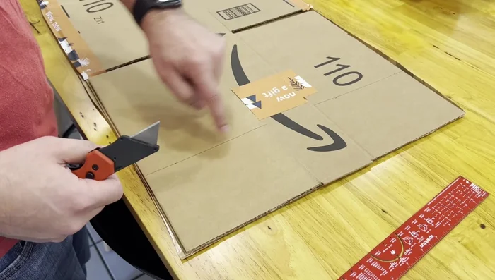 Cut the flaps: Carefully cut along the marked lines to extend the box.