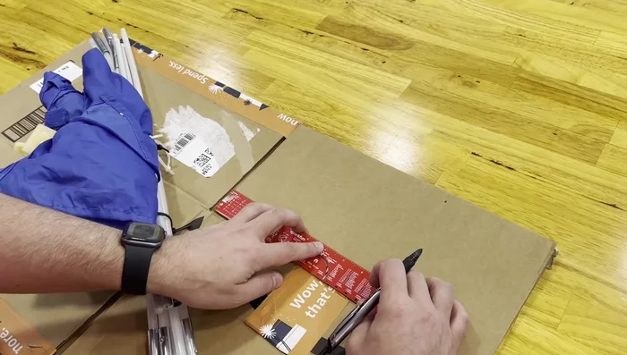 Cut the flaps: Carefully cut along the marked lines to extend the box.