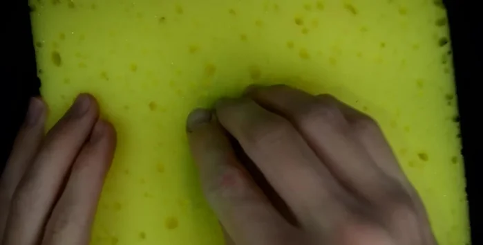 Wipe the stamp on the sponge.