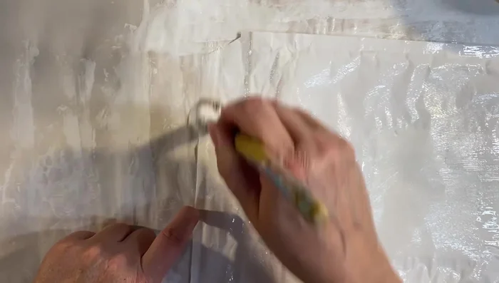 Patching: If the napkin isn't large enough, cut off excess napkin and use it to patch any uncovered areas, matching patterns where possible.