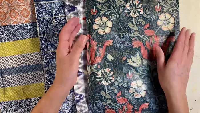 Dry and finish: Let the envelopes dry completely on parchment paper. Once dry, trim any excess napkin and add your mailing address to the front and sender's details to the back.