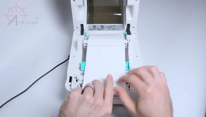 Push the sliders together gently until they just touch the labels.