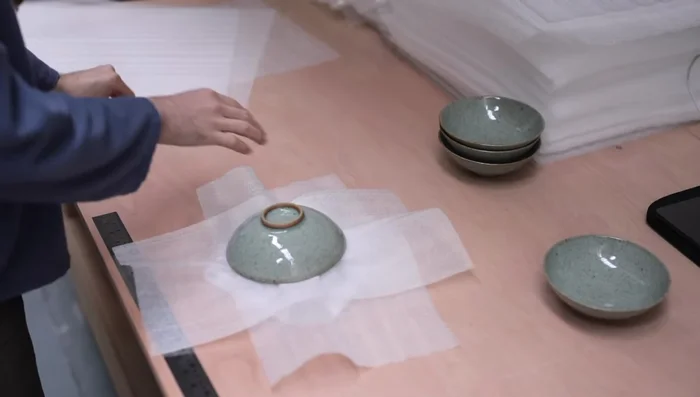 Pack multiple bowls: Stack bowls with foam between each, ensuring no rattling. Wrap the stack and pack centrally in a box.