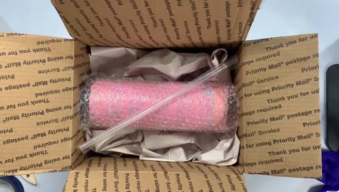 Include a thank you card, business card, and any additional items.