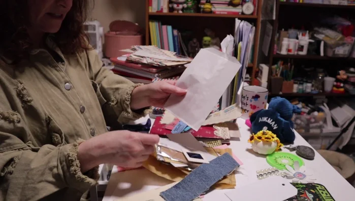 Layer stamps with other materials like paper and fabric.