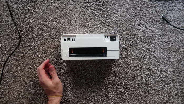 Connect the printer's power supply and USB cable.