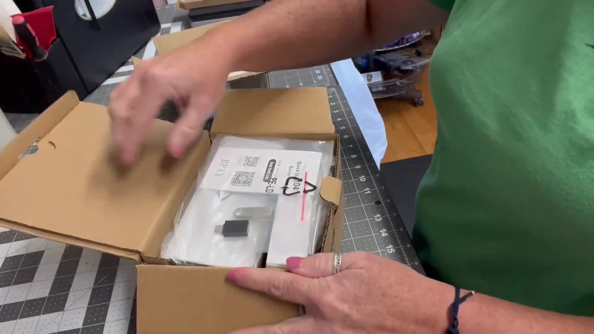 The printer's packaging showing its protective design.
