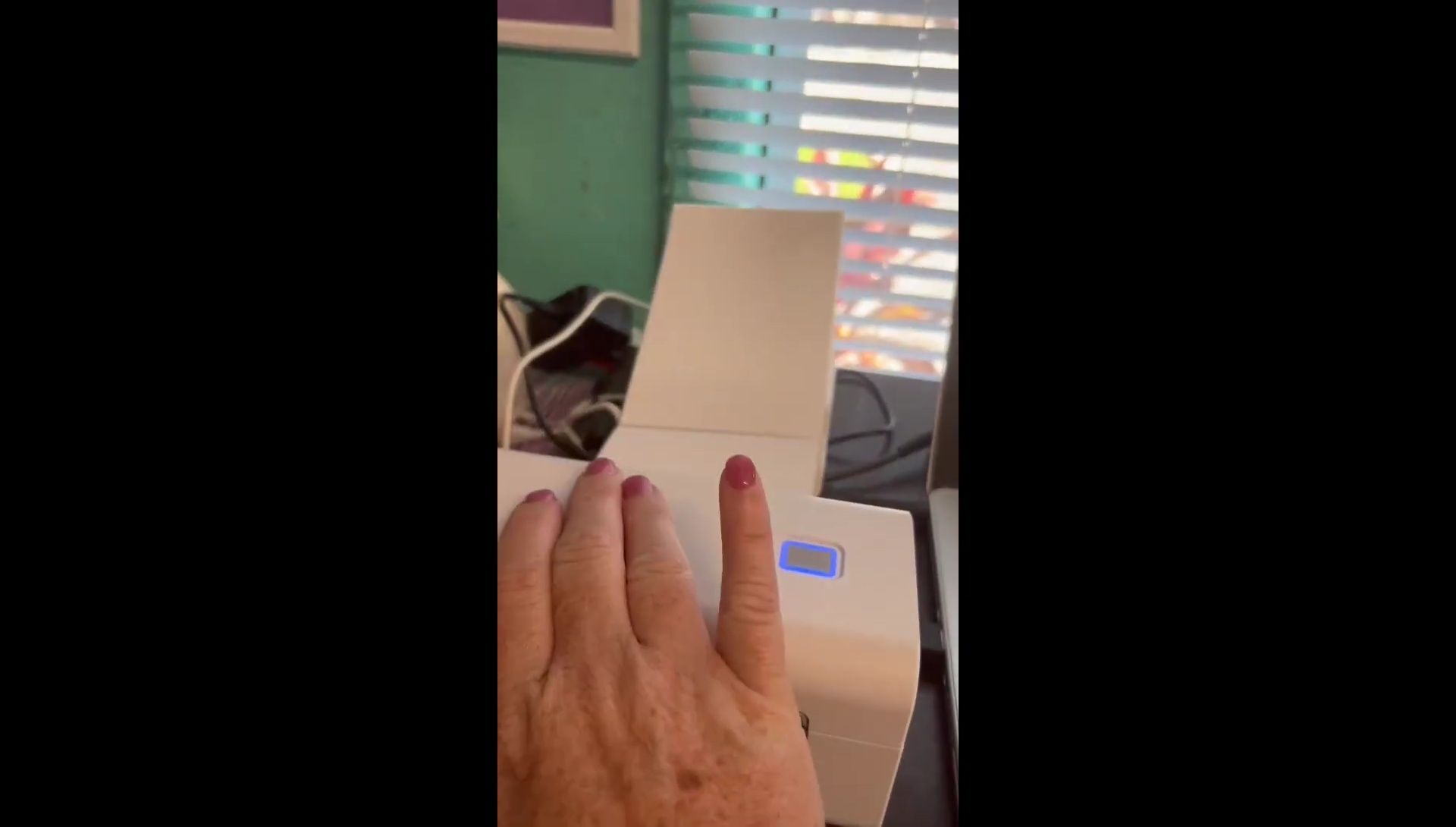 The reviewer demonstrating the printing process.