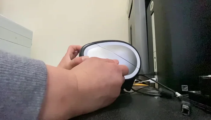 Keep holding the reset button for about 10 seconds after plugging in both cables.