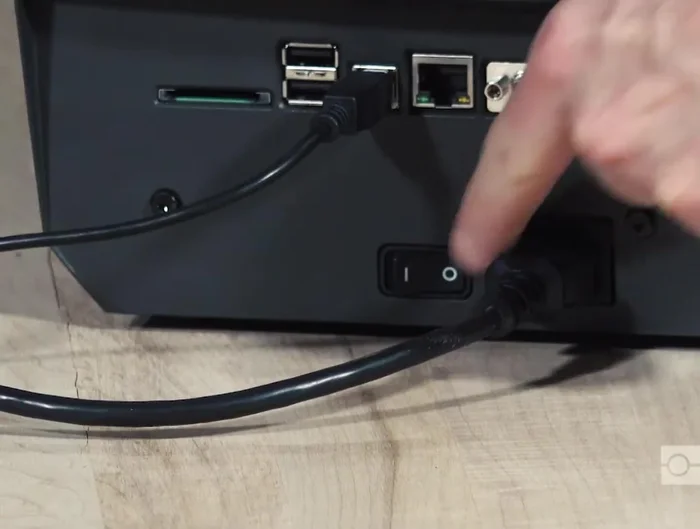 Remove the label roll and ribbon from the printer.