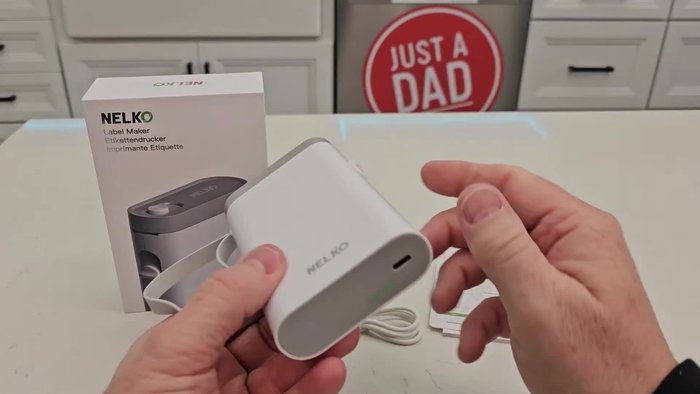 Remove the protective label from the printer tape. If it's difficult to remove cleanly, tear it off.