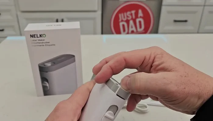 Remove the protective label from the printer tape. If it's difficult to remove cleanly, tear it off.