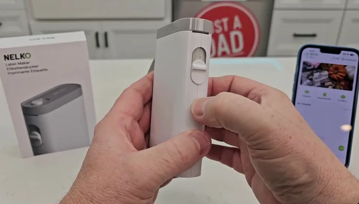 To turn off the label maker, press and hold the power button until it beeps twice.