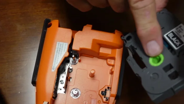 Press firmly to secure the tape.