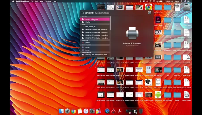Open System Preferences > Printers & Scanners.