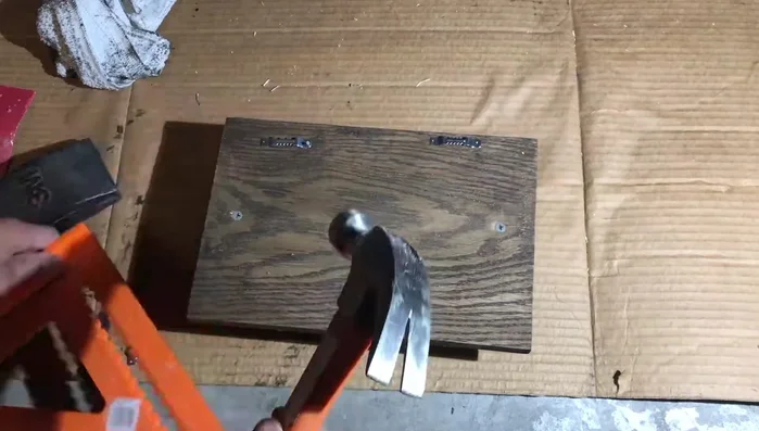 Attach picture frame hangers to the back for wall mounting.