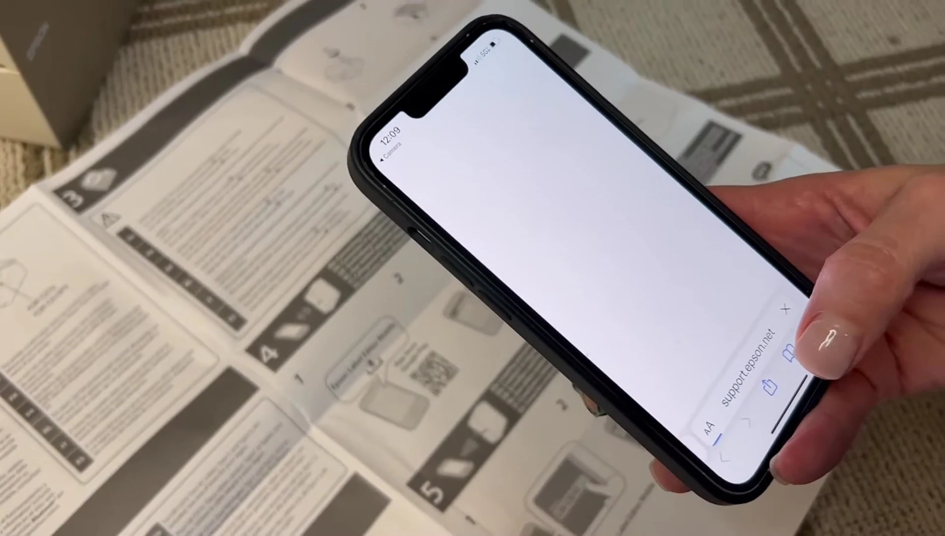 Scanning the QR code to download the app