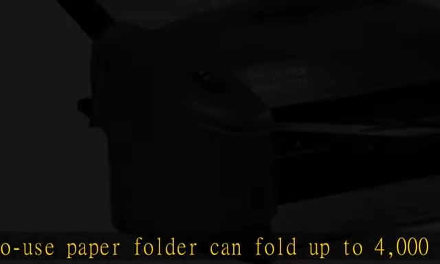 Another view of the paper folding process