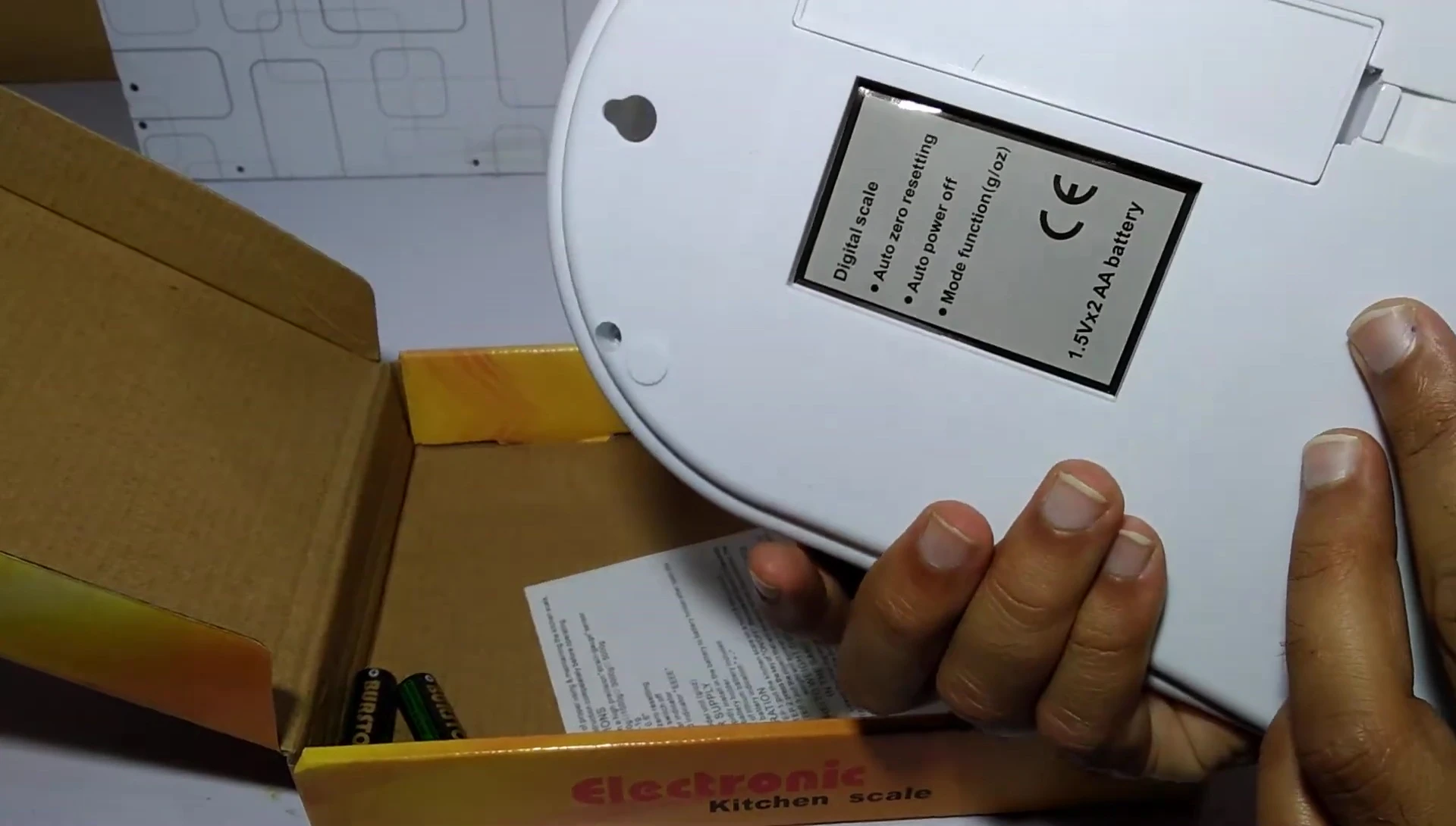 The SF-400 digital kitchen scale inside its packaging