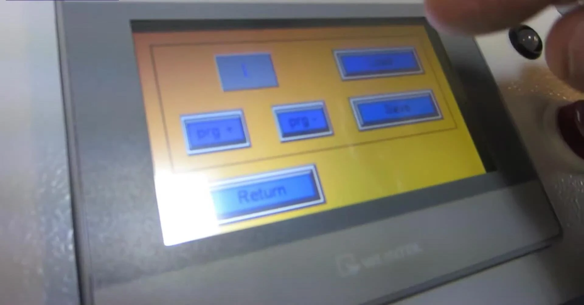 The touchscreen showing the job selection menu.