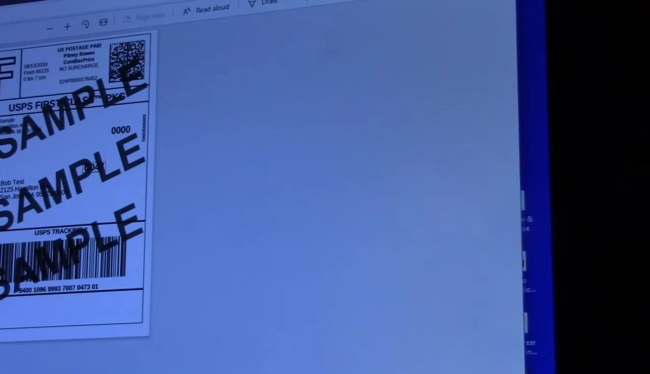 The reviewer selecting print settings on their computer