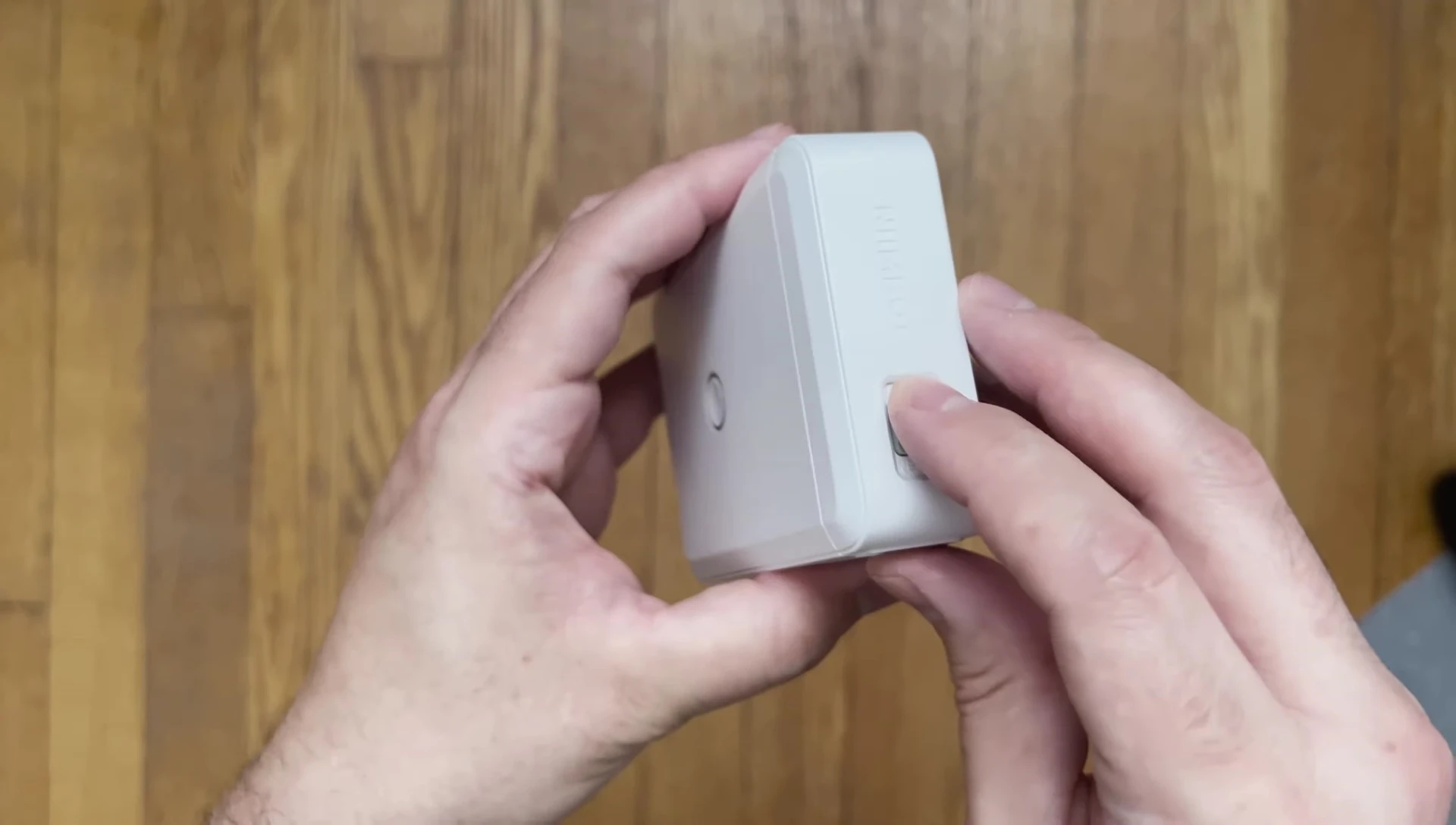 Demonstrating how to insert the label roll