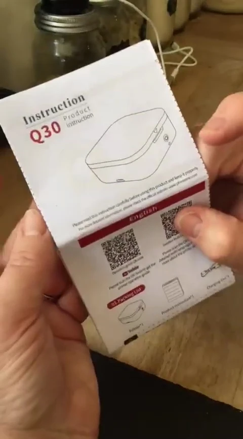 Instruction leaflet and QR code for video tutorial.