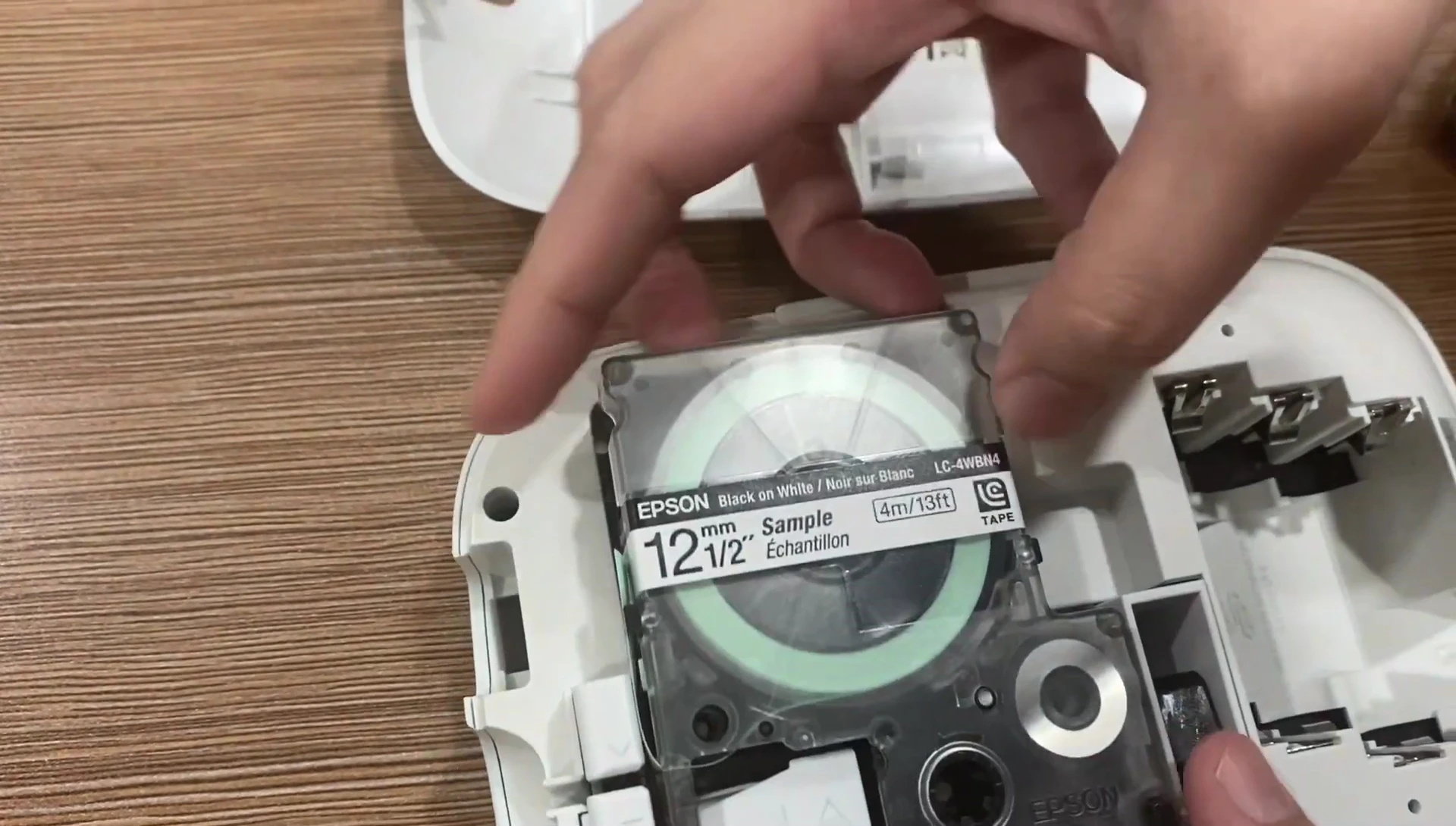 Inserting the tape cartridge into the printer.