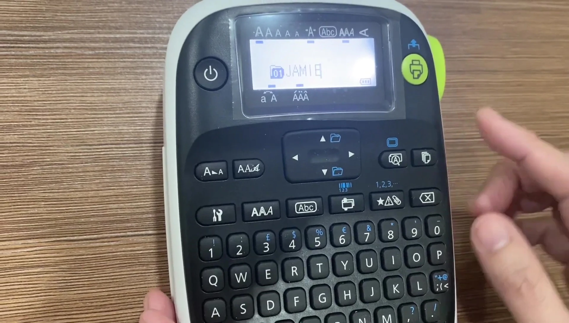 Typing text and selecting print options on the printer's display.