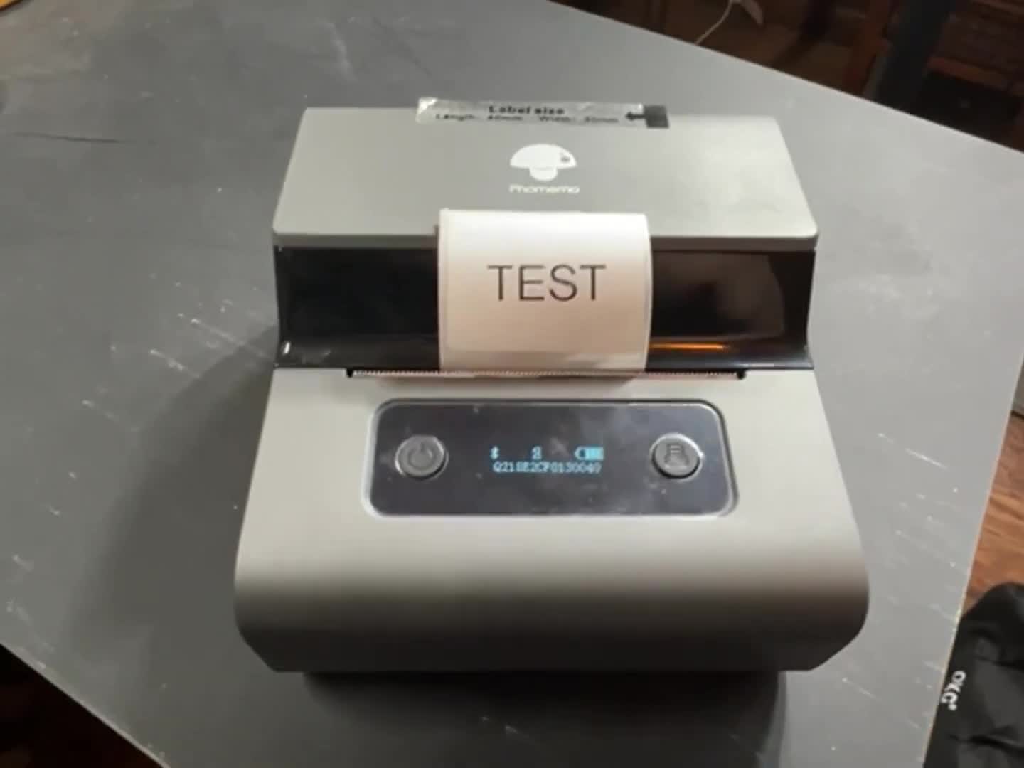 Close-up of the Phomemo M221 label maker in its packaging.