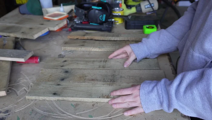 Arrange and dry-fit the wood pieces to determine the best arrangement.