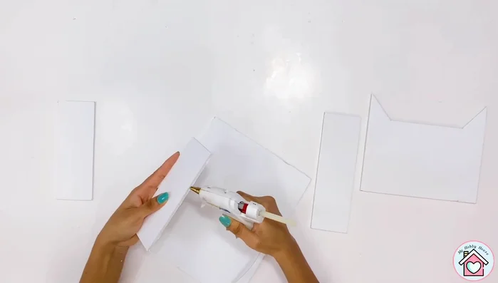 Attach all the foam board pieces using a hot glue gun.