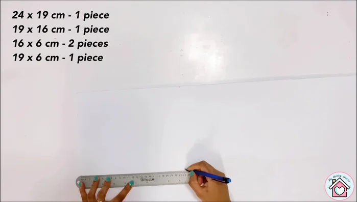 Measure and cut a smaller piece for the top, creating the shape as shown in the video.