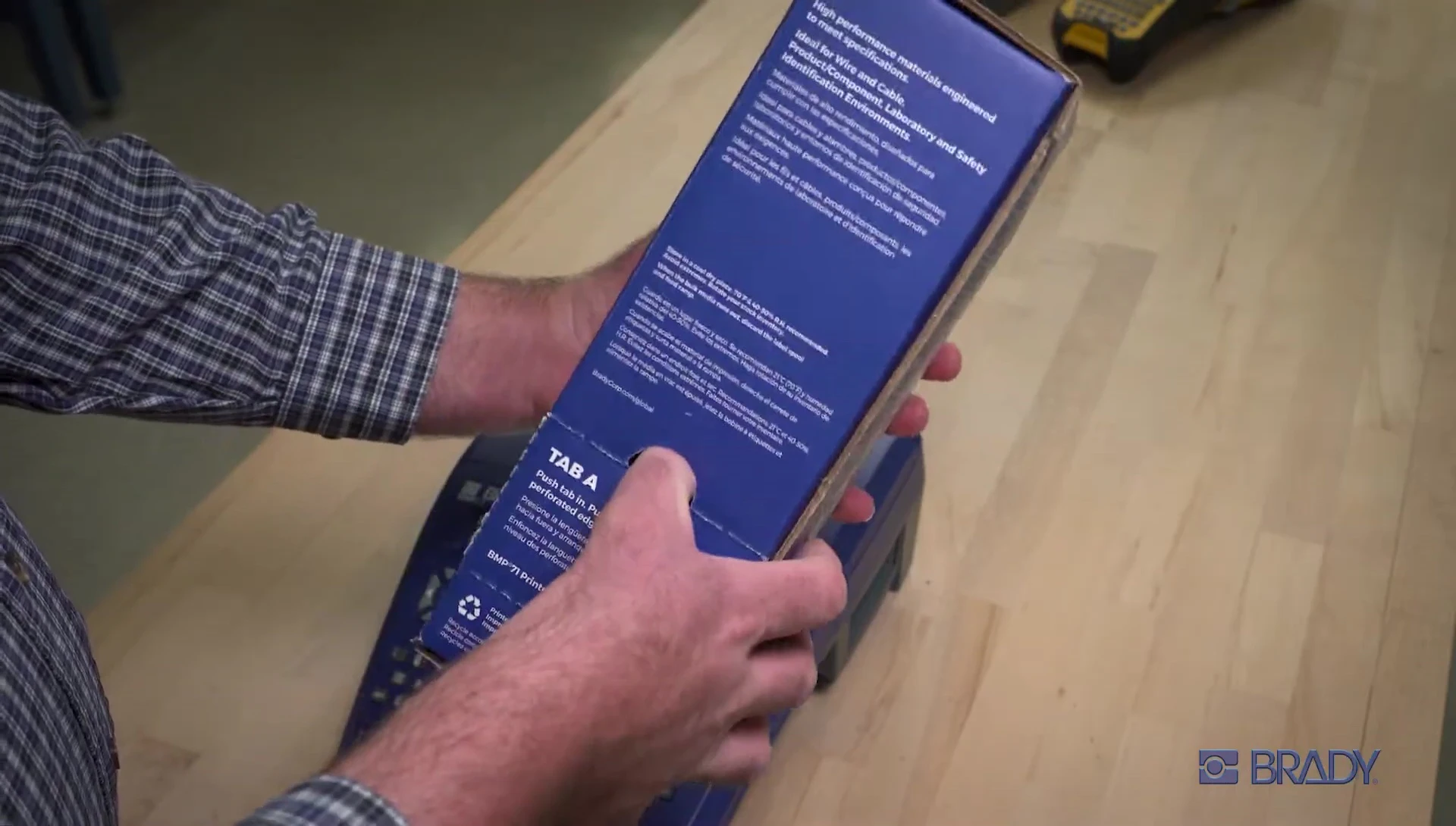 Opening the box and identifying the correct tab