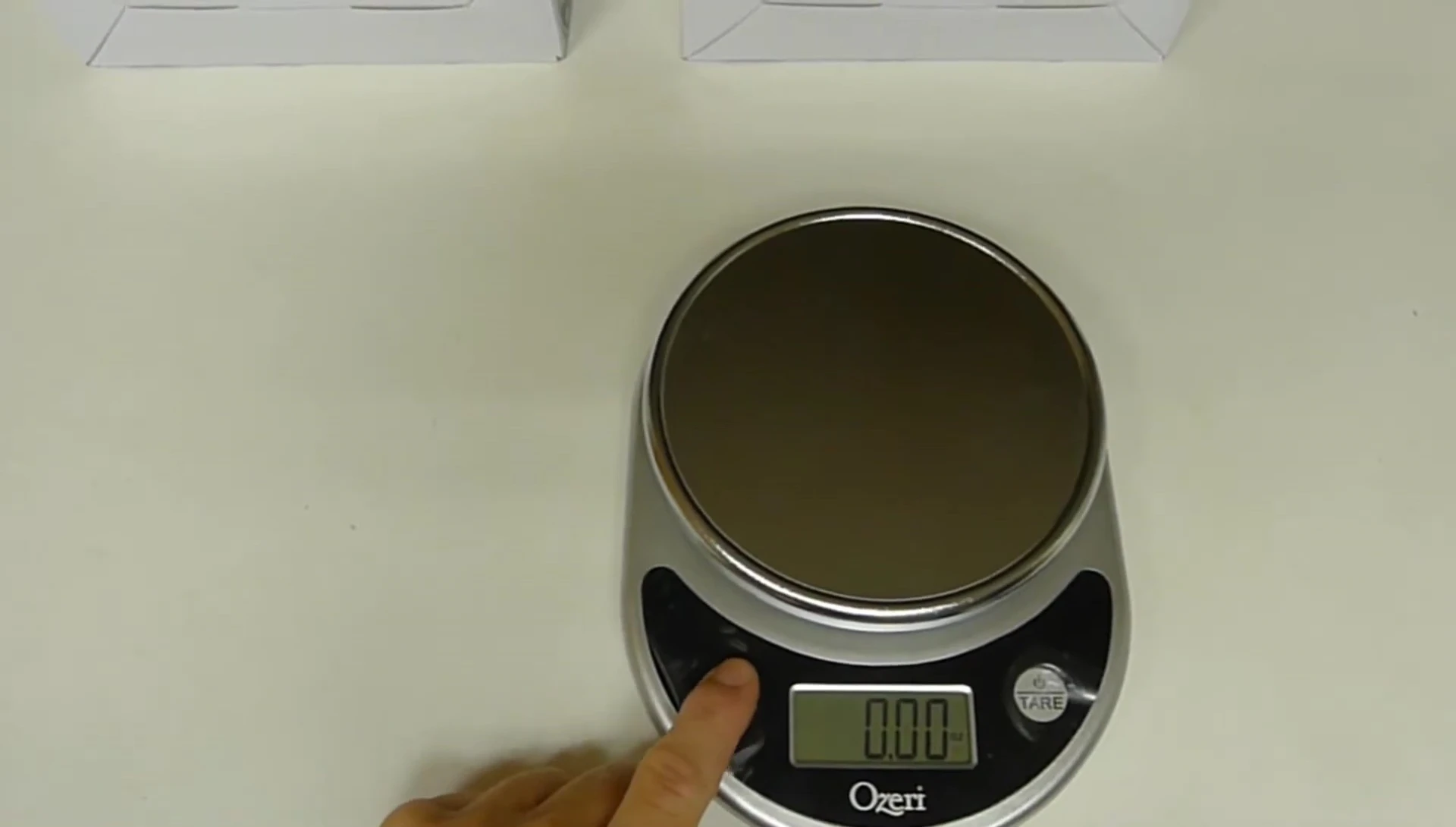 The scale displaying weight in milliliters.